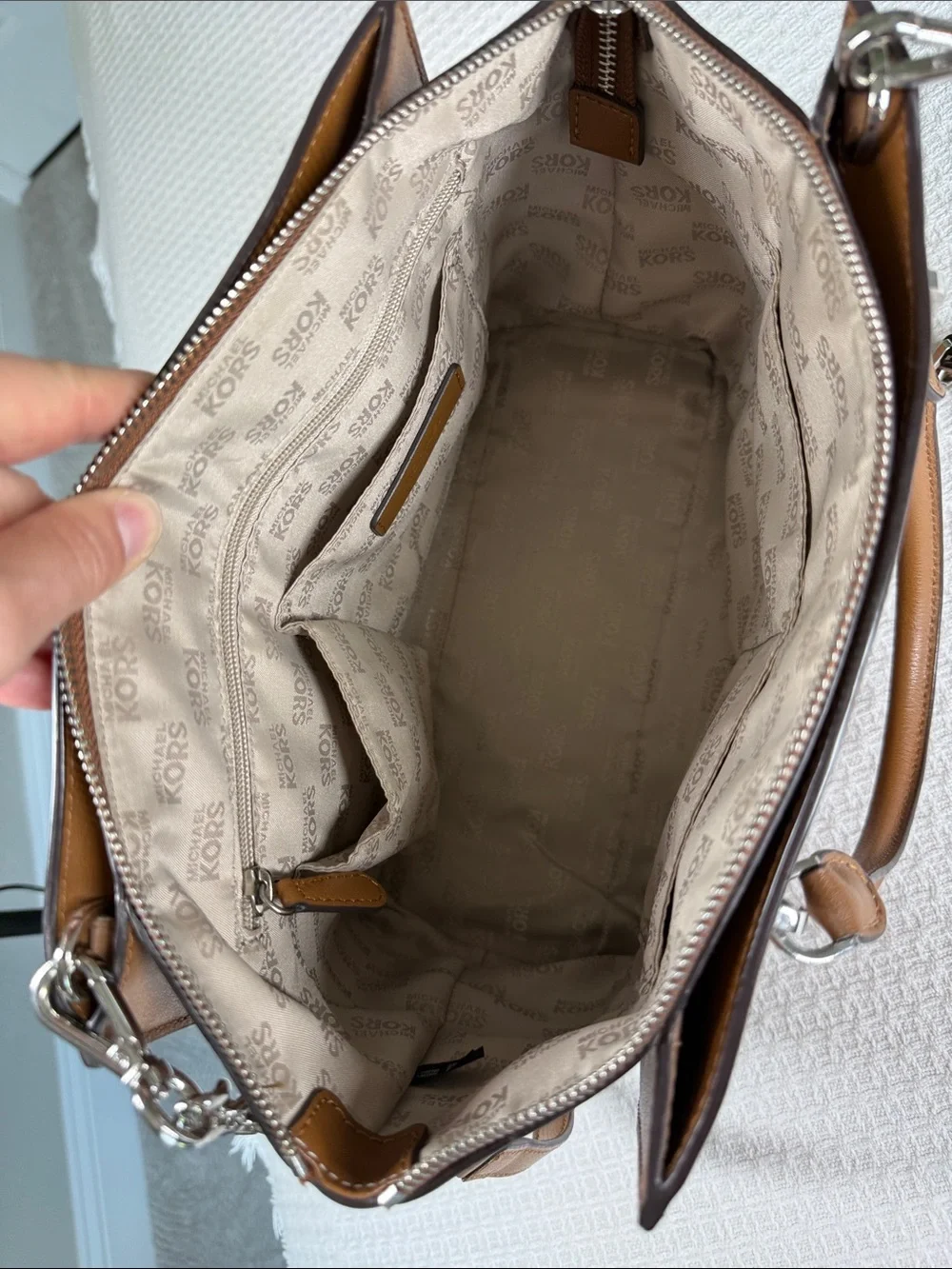 Michael Kors saddle tan saffiano leather satchel with silver hardware